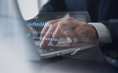 stock-photo-businessman-using-laptop-computer-analyzing-sales-data-and-financial-growth-graph-chart-report